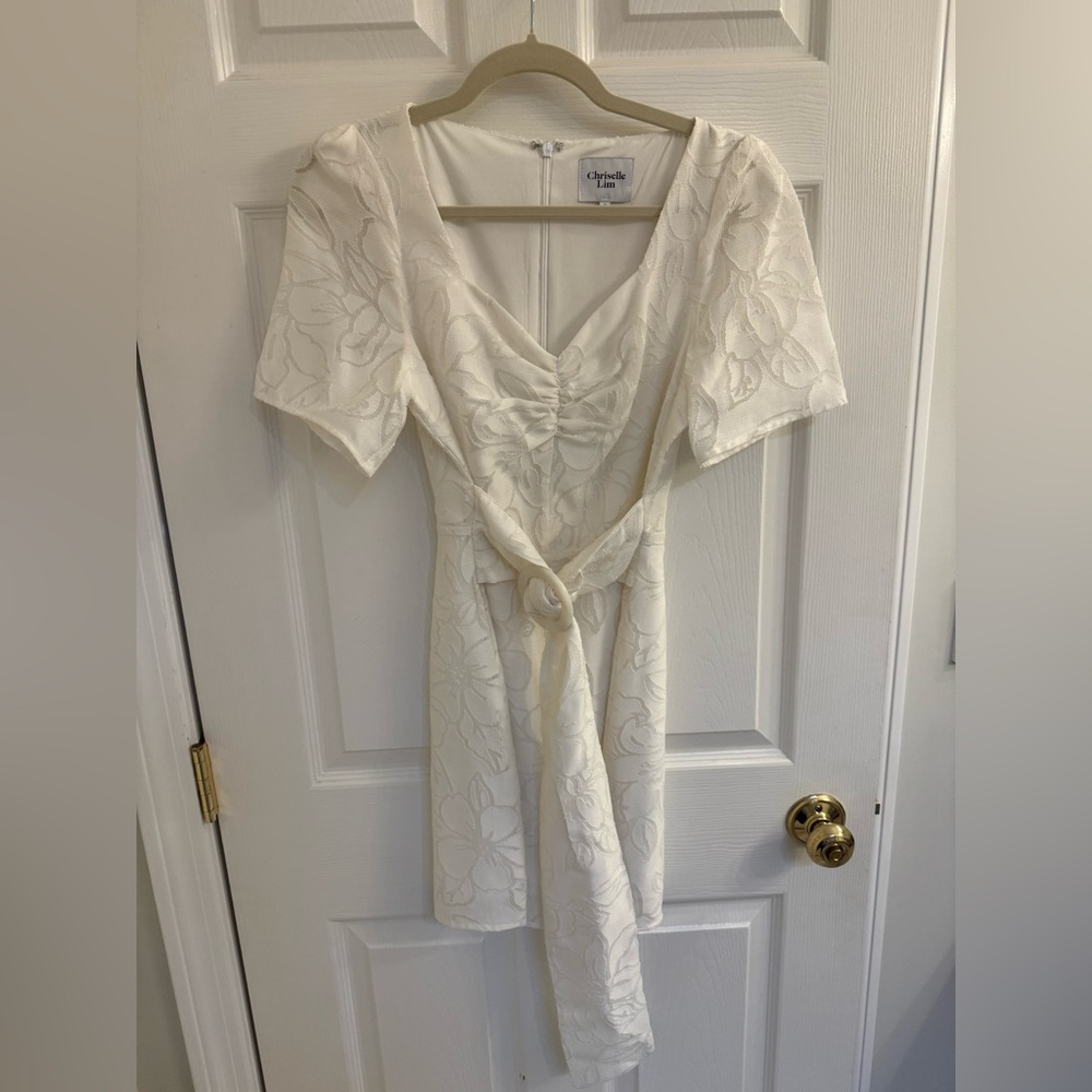 Chic White Dress with Floral Design